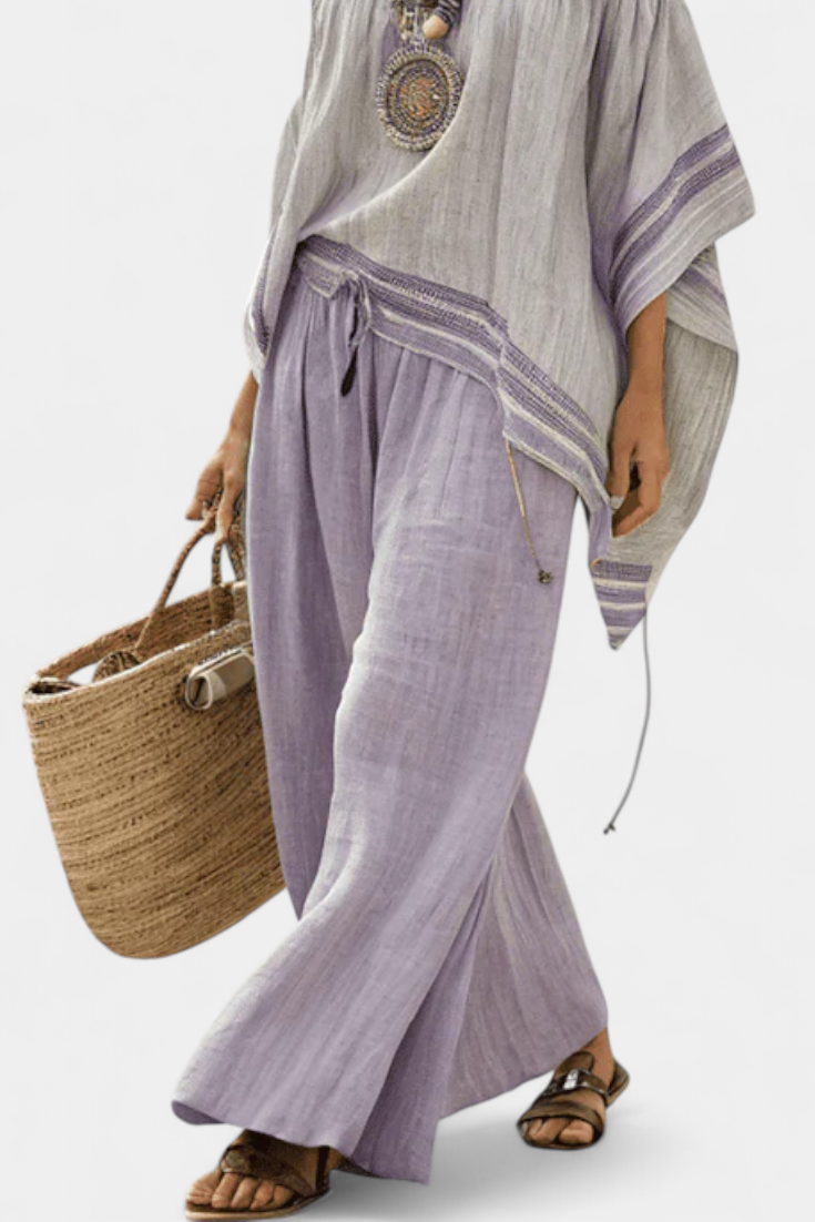 Serenella - épaules nues et pantalons à jambes larges rayés