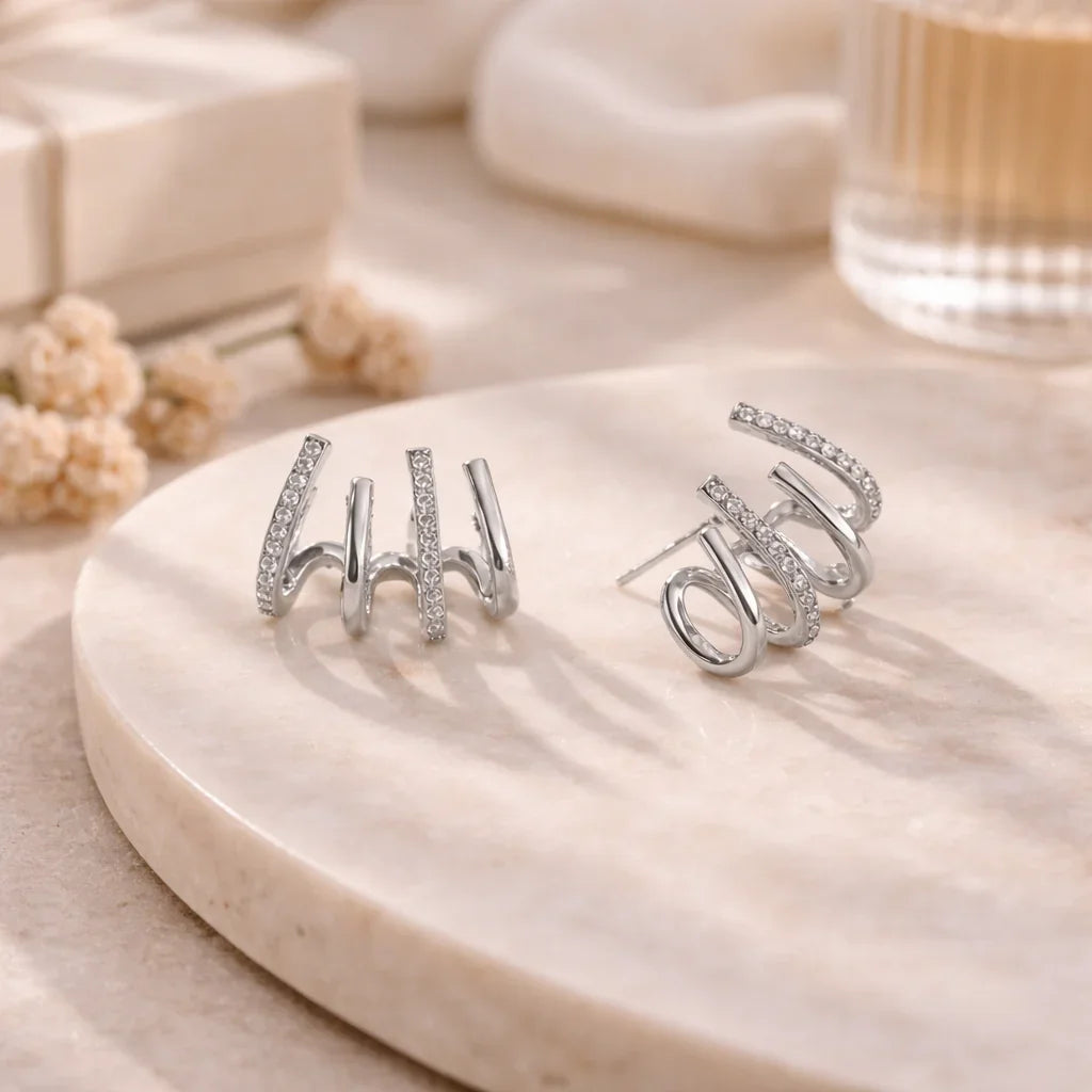 Yasmin | Boucles d’oreilles style griffe avec zircons