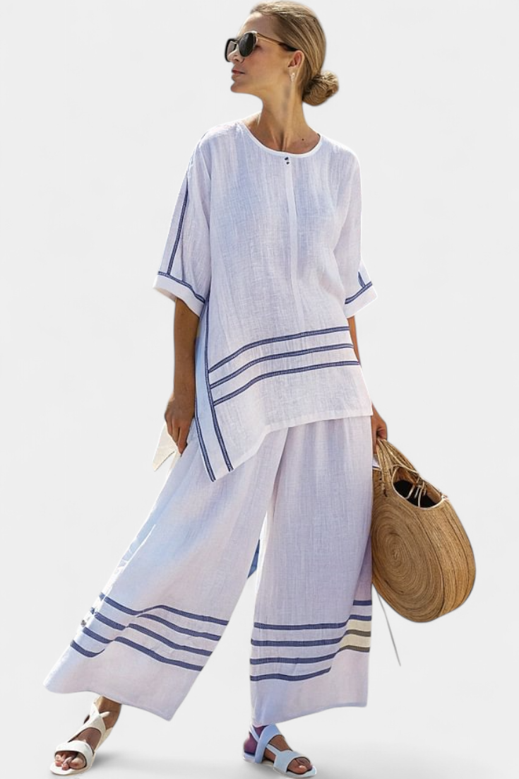 Vittorina – top asymétrique à rayures sophistiqué et pantalons audacieux