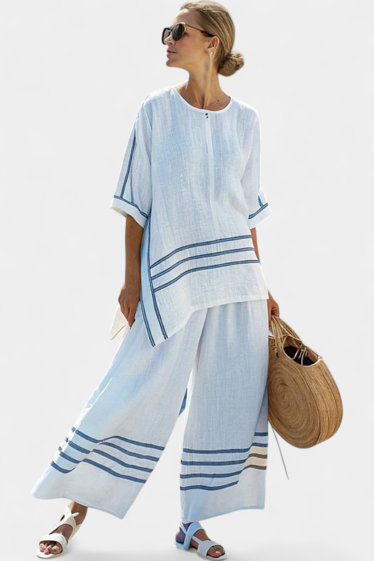 Vittorina – top asymétrique à rayures sophistiqué et pantalons audacieux