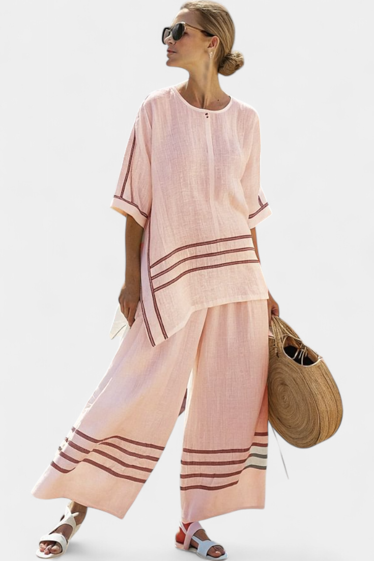 Vittorina – top asymétrique à rayures sophistiqué et pantalons audacieux