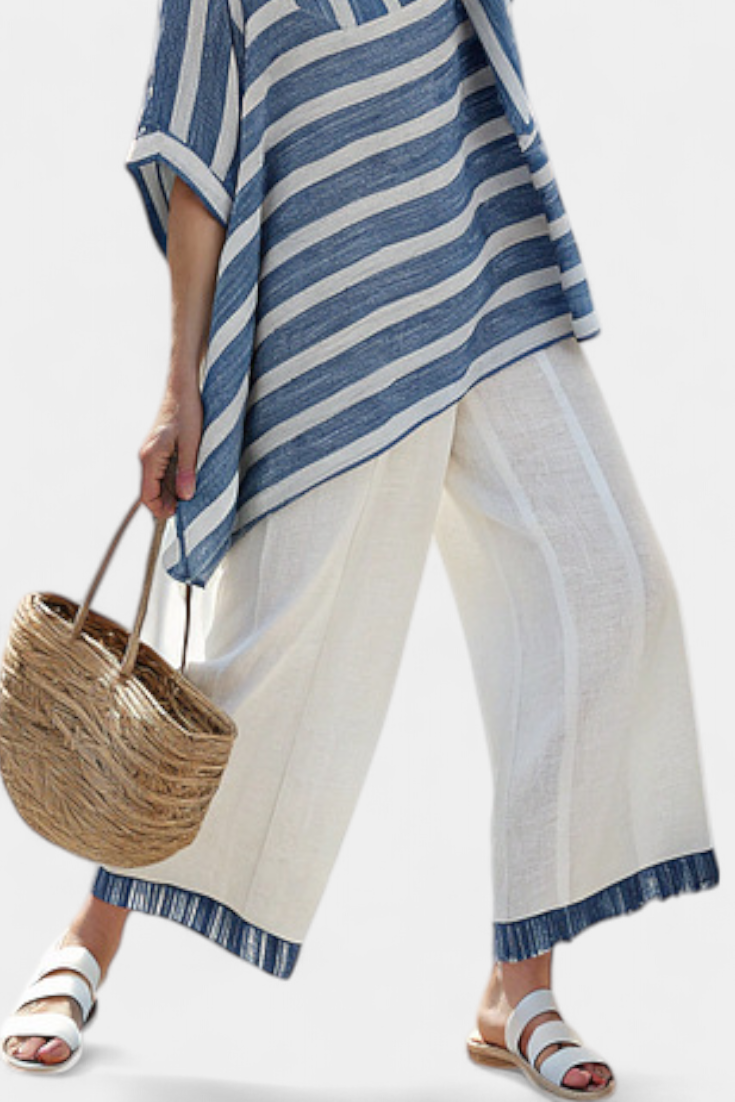 Ornella – haut bleu sophistiqué à rayures et pantalons avec détails en bas