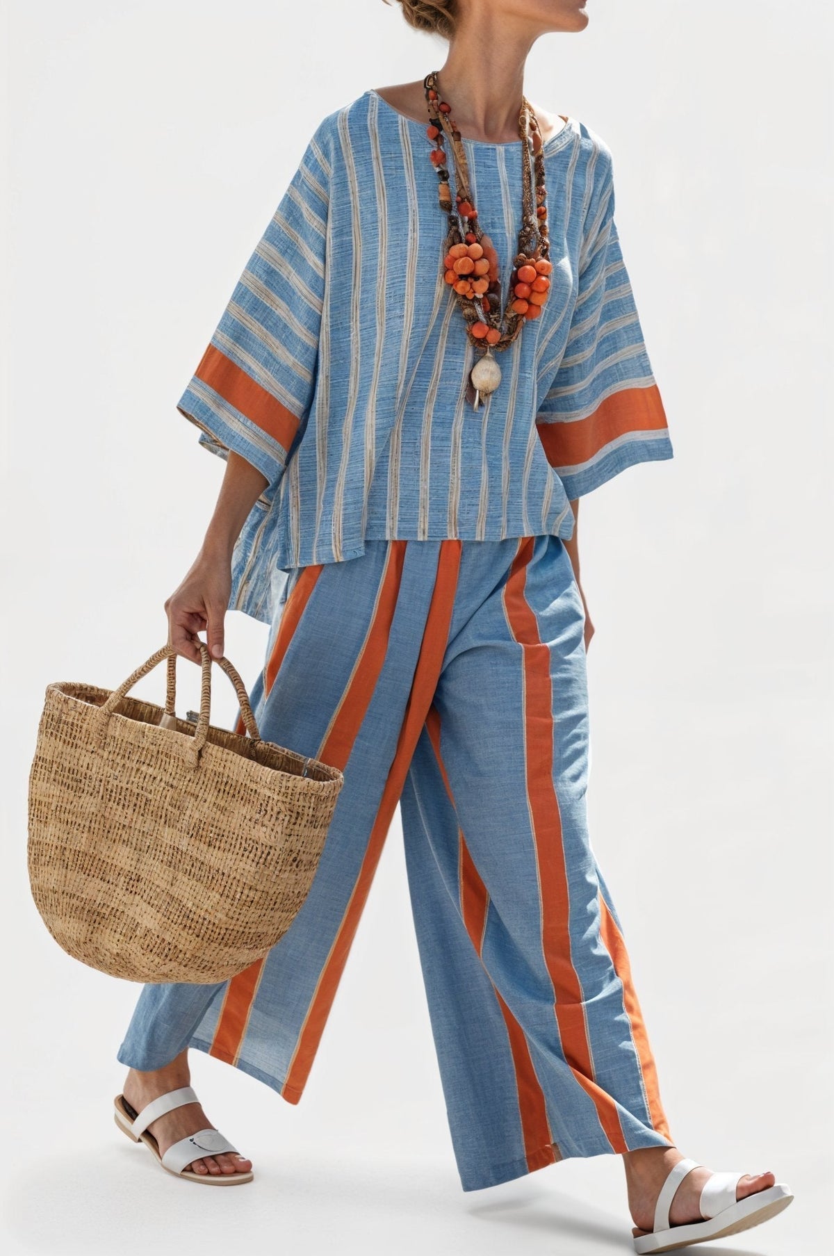 Valeria – haut strié terracotta sophistiqué et pantalons en lin