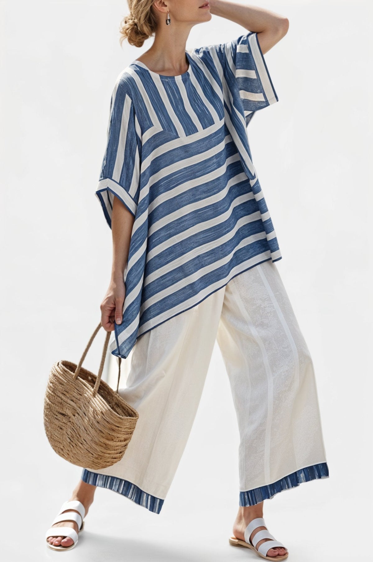 Ornella – haut bleu sophistiqué à rayures et pantalons avec détails en bas
