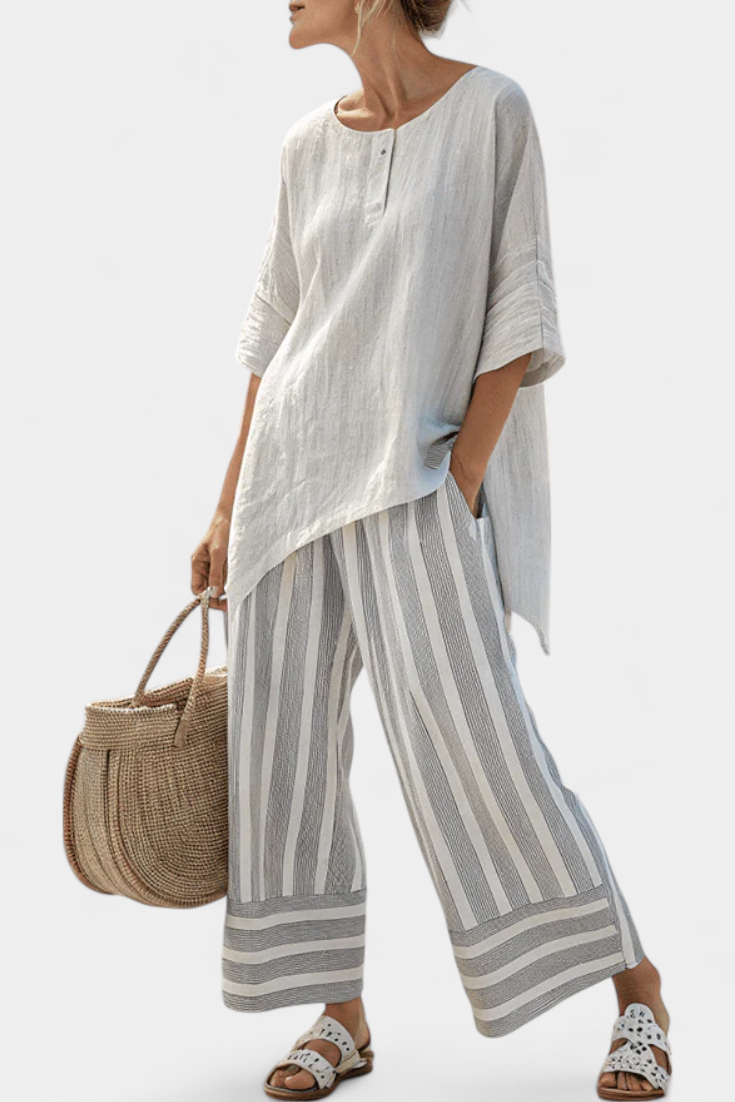 Fiorella – blouse asymétrique élégante et pantalons rayés