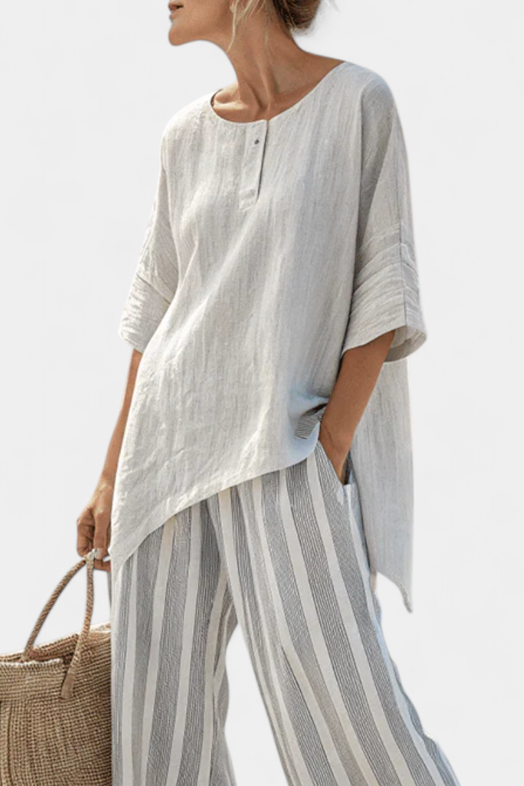 Fiorella – blouse asymétrique élégante et pantalons rayés
