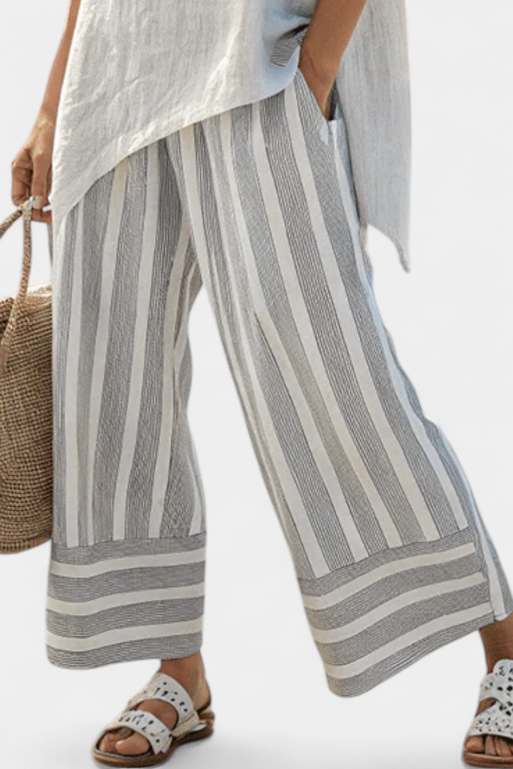 Fiorella – blouse asymétrique élégante et pantalons rayés